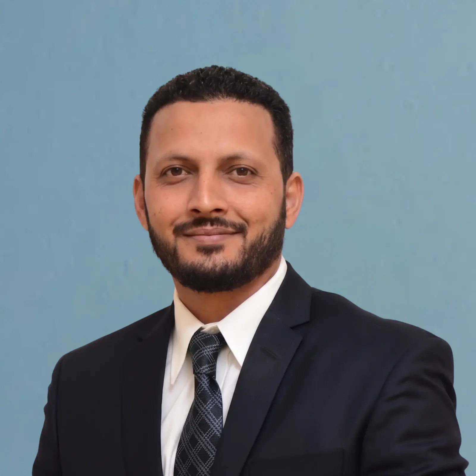 Headshot photo of Syed Tahseen